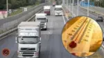 вантажівки їдуть по трасі та термометр який показує високу температуру